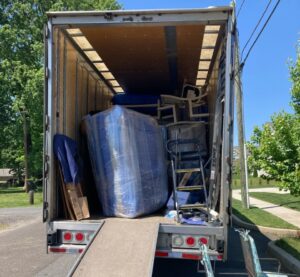 family moving with the help of professional movers